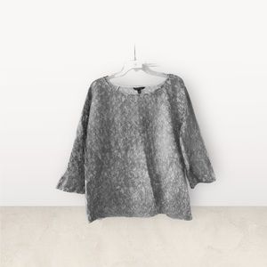 Retro-style, 3/4 length sleeve, A-line top. Never worn, XL, metallic lame.